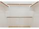 A clean and organized closet with shelving and rods to maximize storage space at 1701 E Colter St # 311, Phoenix, AZ 85016