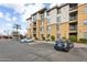 Exterior view of apartment building and parking area at 1701 E Colter St # 311, Phoenix, AZ 85016