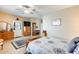 Comfortable main bedroom offering tile floors and plenty of space for furnishings and personal touches at 18360 N 169Th Ave, Surprise, AZ 85374