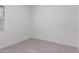Cozy bedroom with light-colored carpet, white walls and natural light at 18988 W Cortez St, Surprise, AZ 85388