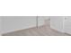 Bedroom with beige carpet, white walls, and white trim and doors at 18988 W Cortez St, Surprise, AZ 85388