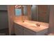 Bathroom features double sinks and a large mirror for added convenience at 20479 N 105Th Ave, Peoria, AZ 85382
