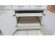 White kitchen cabinet with pull out shelves at 20479 N 105Th Ave, Peoria, AZ 85382
