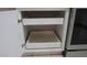 White kitchen cabinet with pull out shelves at 20479 N 105Th Ave, Peoria, AZ 85382