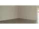 A bright, naturally lit room with plank flooring and neutral colored walls at 20479 N 105Th Ave, Peoria, AZ 85382