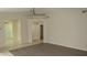 Inviting living room featuring tile floors, neutral walls, and an arched doorway at 20479 N 105Th Ave, Peoria, AZ 85382