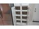 Built-in white pantry with slide out shelves at 20479 N 105Th Ave, Peoria, AZ 85382