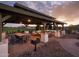 Community pavilion with a dining area, BBQ grills, and gathering space at 21975 S 193Rd Way, Queen Creek, AZ 85142