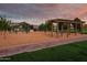 Playground with swings and mature landscaping provides a recreational area at 21975 S 193Rd Way, Queen Creek, AZ 85142