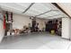 Spacious two car garage featuring clean epoxy floors and ample storage at 2212 W Calle De Las Estrella St, Phoenix, AZ 85085
