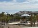 Community park featuring desert landscaping, seating and shade for hot summer days at 23984 W Cocopah St, Buckeye, AZ 85326