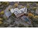 Beautiful home with a pool and solar panels is nestled among the desert landscaping at 25031 N Paso Trl, Scottsdale, AZ 85255