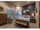 Bedroom with a statement wall and leather accents at 25031 N Paso Trl, Scottsdale, AZ 85255