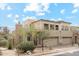 Stunning exterior elevation showcasing the home's architectural details, three-car garage and desert landscaping at 28990 N White Feather E Ln # 182, Scottsdale, AZ 85262