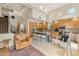 Open-concept kitchen with an island, bar seating, and modern appliances, perfect for entertaining and daily living at 28990 N White Feather E Ln # 182, Scottsdale, AZ 85262