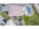 Aerial view of a home with a swimming pool, patio, and well-maintained landscaping at 30419 N Plantation Dr, San Tan Valley, AZ 85143