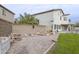The backyard space features a stone area and raised garden beds, perfect for relaxation and planting at 30419 N Plantation Dr, San Tan Valley, AZ 85143