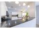 Well-appointed kitchen featuring granite countertops and modern stainless steel appliances at 30419 N Plantation Dr, San Tan Valley, AZ 85143