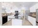 Bright kitchen featuring granite counters, stainless steel appliances and tile flooring at 30419 N Plantation Dr, San Tan Valley, AZ 85143