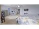 Comfortable bedroom with a ceiling fan and connecting doors to the bathroom and another room at 30419 N Plantation Dr, San Tan Valley, AZ 85143