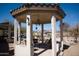 This backyard features a gazebo with seating and a chandelier at 3721 N Brindley Ave, Litchfield Park, AZ 85340