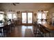 Open kitchen with stainless steel appliances, counter seating and view of dining area at 3721 N Brindley Ave, Litchfield Park, AZ 85340