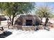 Outdoor fireplace on a patio area perfect for entertaining at 3721 N Brindley Ave, Litchfield Park, AZ 85340
