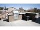 An outdoor kitchen area with a built-in grill for backyard entertaining at 3721 N Brindley Ave, Litchfield Park, AZ 85340