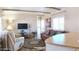 Inviting living room with a comfortable recliner, couch, and a view to an open concept at 4065 E University Dr # 471, Mesa, AZ 85205