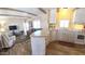 Bright living room with a large window, kitchen with modern appliances, creating an open and welcoming space at 4065 E University Dr # 471, Mesa, AZ 85205
