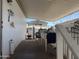 Cozy covered porch with a table, chair, and decorations, ideal for relaxation and enjoying the outdoors at 4065 E University Dr # 471, Mesa, AZ 85205