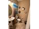 A charming bathroom adorned with nautical-themed decorations creates a serene and delightful atmosphere at 4134 E Bellerive Dr, Chandler, AZ 85249