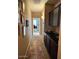 Hallway with decorative art, built-in cabinets and lighting at 4134 E Bellerive Dr, Chandler, AZ 85249