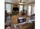 Cozy living room with a dark leather sofa and a view of the backyard at 4134 E Bellerive Dr, Chandler, AZ 85249