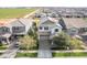 Aerial view of a home showing landscaping, driveway and surrounding neighborhood at 4381 E Rawhide St, Gilbert, AZ 85296