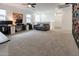 Bright bonus room with climbing wall, neutral paint, and a cozy seating area at 4381 E Rawhide St, Gilbert, AZ 85296