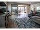 Inviting living area with seamless indoor-outdoor flow to screened patio with pool views at 4381 E Rawhide St, Gilbert, AZ 85296
