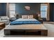 Well-appointed main bedroom featuring a king-size bed and ample natural light at 4381 E Rawhide St, Gilbert, AZ 85296
