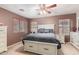 Cozy bedroom with a ceiling fan, carpet, and a serene ambiance at 45608 W Barbara Ln, Maricopa, AZ 85139