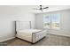 Neutral bedroom featuring a plush bed, soft carpeting, and a window with blinds at 5100 E Rancho Paloma Dr # 2061, Cave Creek, AZ 85331
