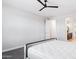 Neutral bedroom with a plush bed, soft carpeting, a ceiling fan, and a walk-in closet at 5100 E Rancho Paloma Dr # 2061, Cave Creek, AZ 85331