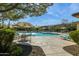Inviting community pool area with plenty of seating and shade at 5100 E Rancho Paloma Dr # 2061, Cave Creek, AZ 85331