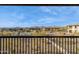Scenic community view from balcony featuring the pool, community landscaping, and mountain views at 5100 E Rancho Paloma Dr # 2061, Cave Creek, AZ 85331