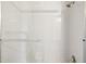 Shower with gray subway tiles, a glass door, a shower head, and a towel rack at 5100 E Rancho Paloma Dr # 2061, Cave Creek, AZ 85331