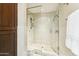 Bathroom features a glass-enclosed shower with modern fixtures and white tile at 8187 E Del Caverna Dr, Scottsdale, AZ 85258