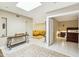 Hallway with a view of the living room and a bedroom entry, plus a skylight at 8187 E Del Caverna Dr, Scottsdale, AZ 85258