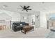Open living space featuring a comfortable sofa, a stylish coffee table, and an open layout for versatile living at 902 W Claremont St, Phoenix, AZ 85013