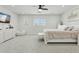 Spacious main bedroom featuring a plush carpet, queen-sized bed, and a mounted TV at 902 W Claremont St, Phoenix, AZ 85013