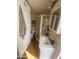 Well-lit bathroom featuring a stand up shower, single sink, and cabinet space for storage at 1147 S Sioux Dr, Apache Junction, AZ 85119