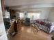 Open-concept living area with laminate flooring and neutral decor at 1147 S Sioux Dr, Apache Junction, AZ 85119